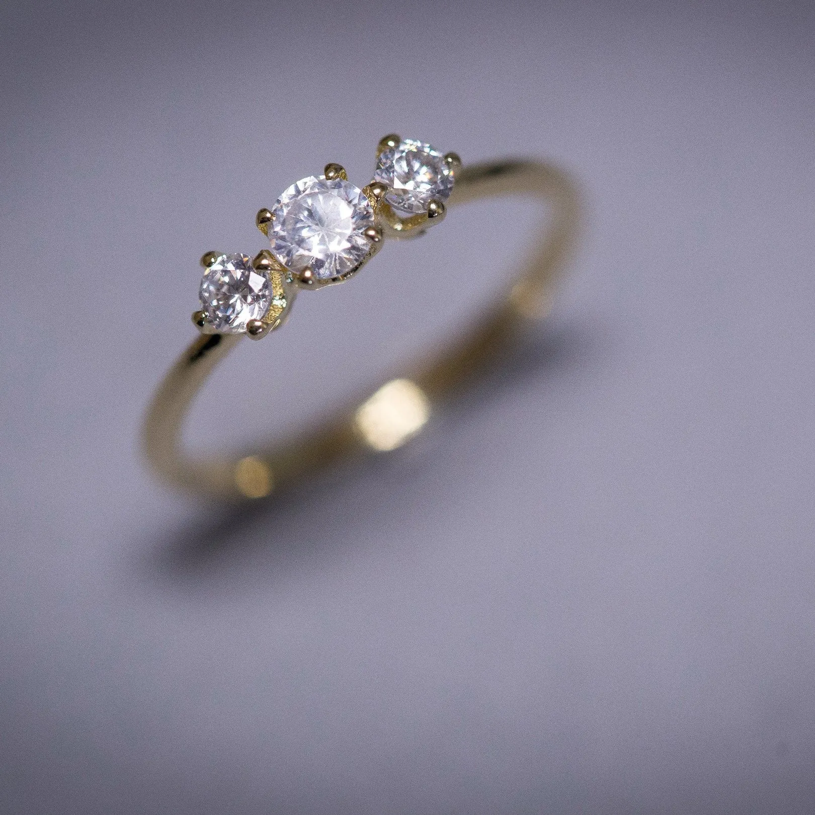 mali - three centered diamonds ring