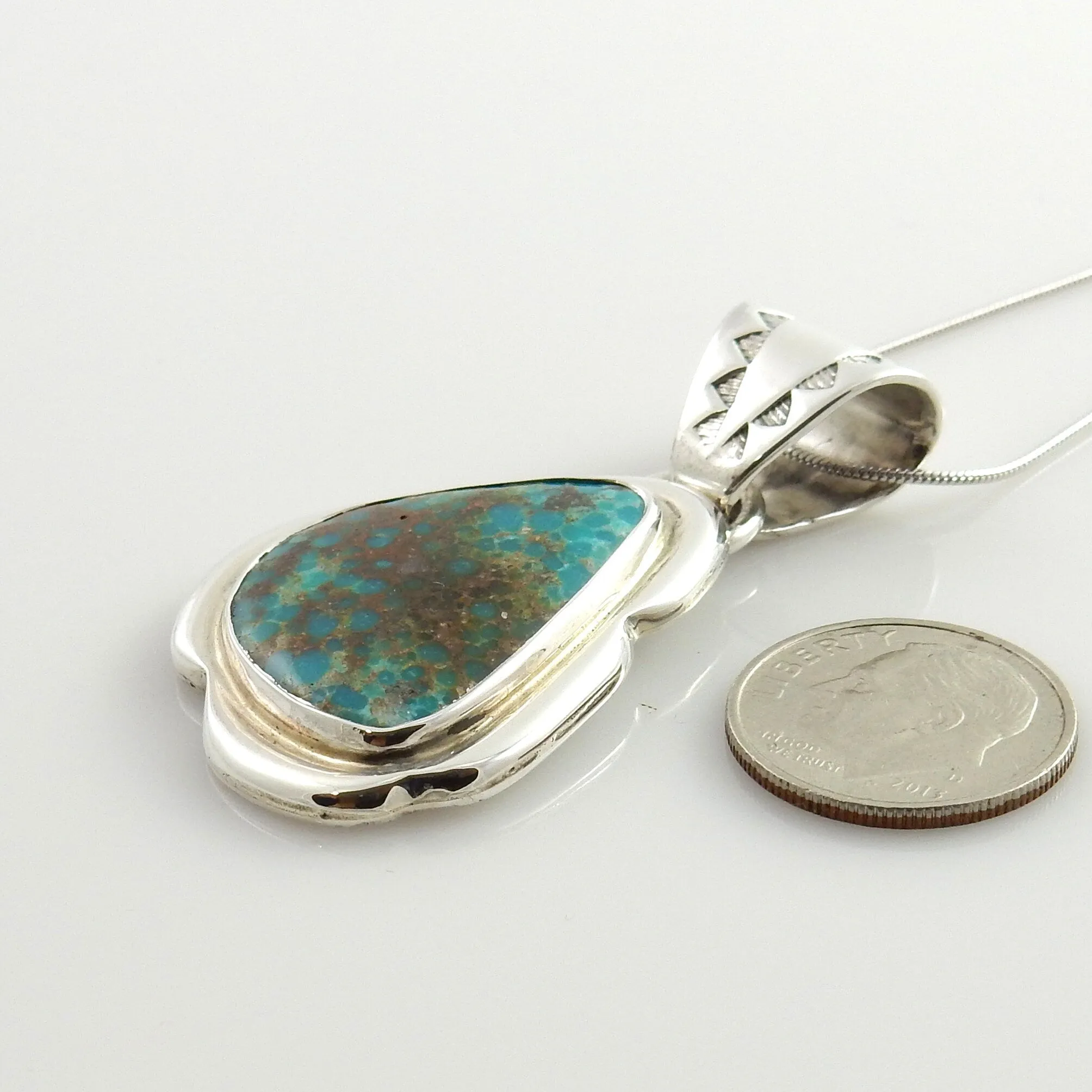 Sterling Silver McGinnis Turquoise Pendant