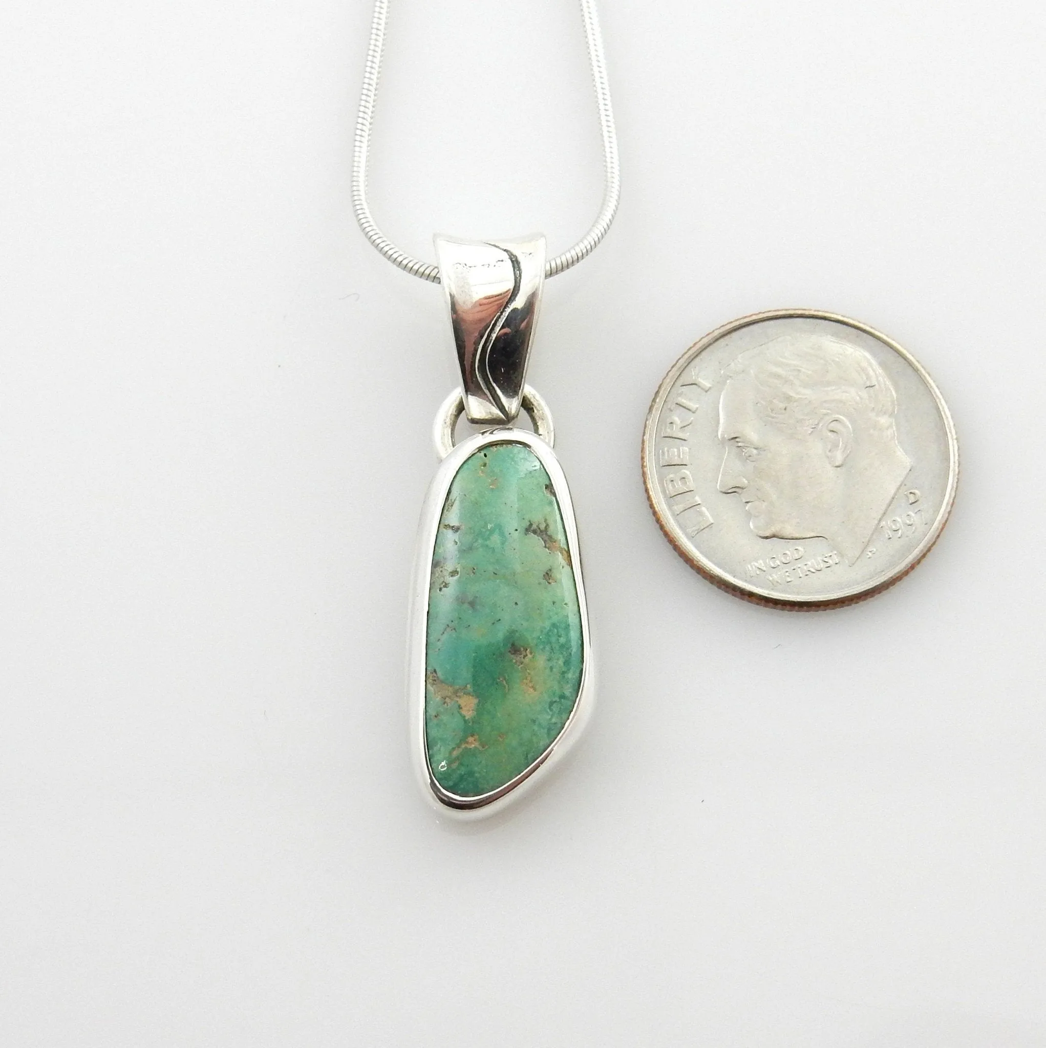 Unique sterling silver turquoise pendant