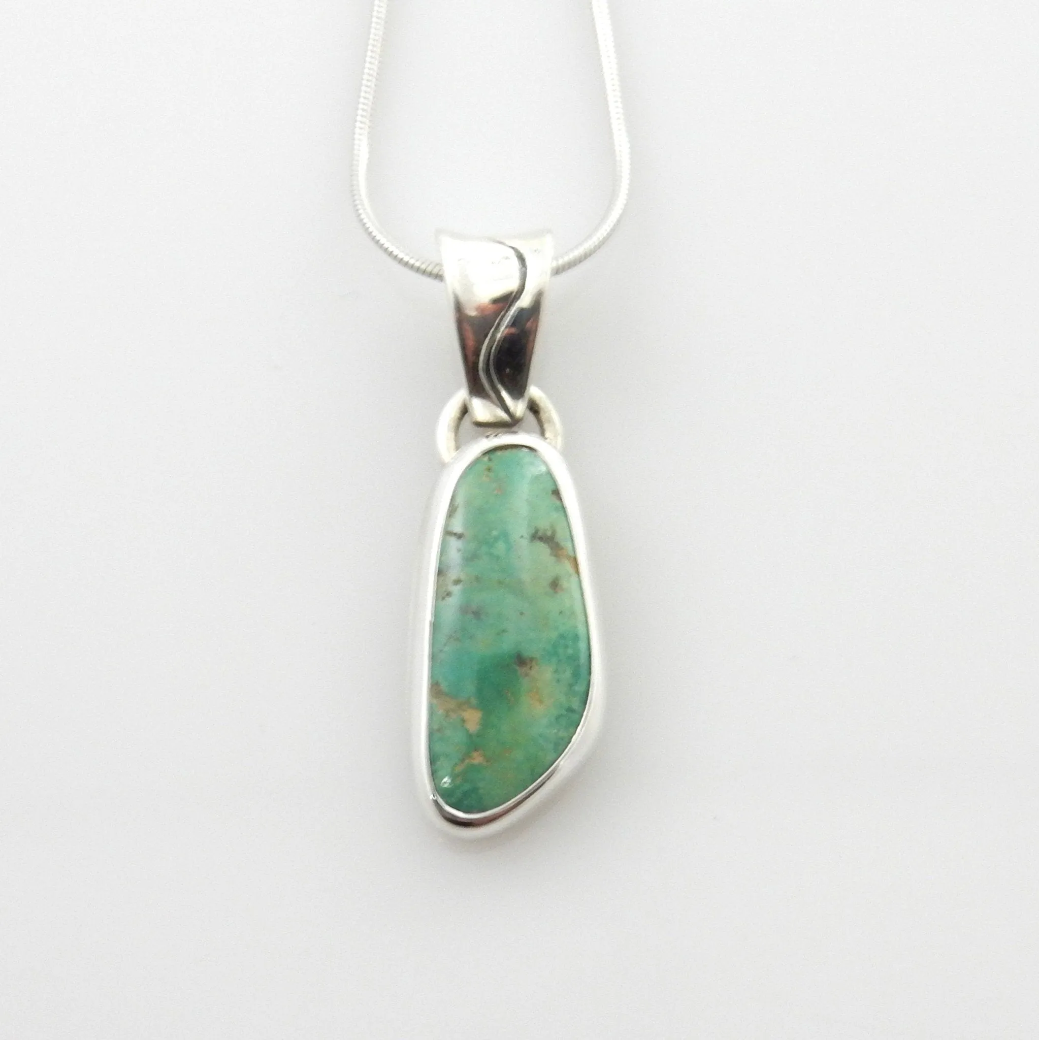 Unique sterling silver turquoise pendant